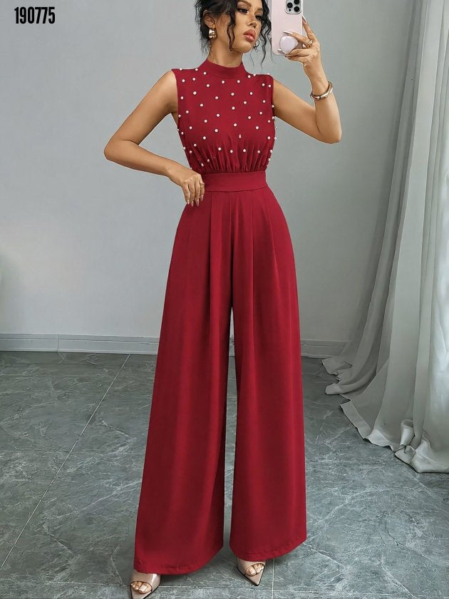 Kadın balıkçı yaka kolsuz incili beli kuşaklı uzun janjan tulum
